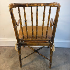 Faux Rattan Armchair with Spindle Back and X Base Stretcher Cognac Leather Pads, Sku 034151
