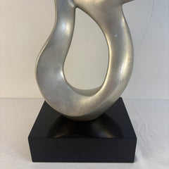 John Richard Resin Sculpture, Features Silver Tri-loop Design on Black Base, Sku 033797