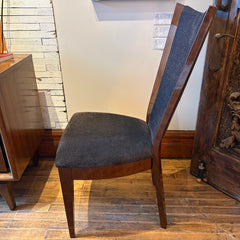 Excelsior Designs Italian Dining Set Consisting of Round Table with 4 Radiant Leaves and 8 Side Chairs. All Constructed in Hard Wood. Chair Upholstery is a Soft Black Textured Fabric. Sku 034039