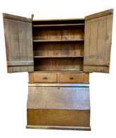 Wooden cabinet with open doors in a room setting