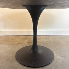 Four Hands Round Dining Table with Textured Tulip Base, Table Surface is Rough Hewn Wood Surrounded in Metal with Rivets, Sku 033836