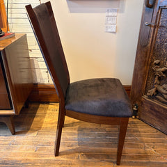 Excelsior Designs Italian Dining Set Consisting of Round Table with 4 Radiant Leaves and 8 Side Chairs. All Constructed in Hard Wood. Chair Upholstery is a Soft Black Textured Fabric. Sku 034039