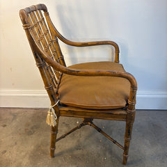 Faux Rattan Armchair with Spindle Back and X Base Stretcher Cognac Leather Pads, Sku 034151