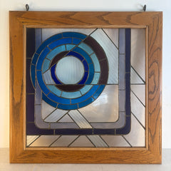 Stained Glass Art Work by John May "Asymmetry" Circles of Blue Framed in Oak, Sku 034162
