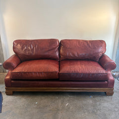 Stanford Leather Sofa in Rustic Oxblood Color Rolled Arms on a Plinth Style Base Sku 033888