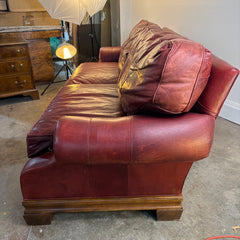 Stanford Leather Sofa in Rustic Oxblood Color Rolled Arms on a Plinth Style Base Sku 033888