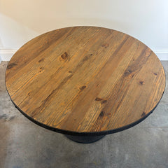 Four Hands Round Dining Table with Textured Tulip Base, Table Surface is Rough Hewn Wood Surrounded in Metal with Rivets, Sku 033836