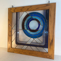 Stained Glass Art Work by John May "Asymmetry" Circles of Blue Framed in Oak, Sku 034162