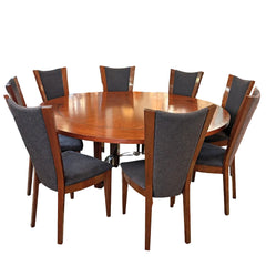 Excelsior Designs Italian Dining Set Consisting of Round Table with 4 Radiant Leaves and 8 Side Chairs.  All Constructed in Hard Wood.  Chair Upholstery is a Soft Black Textured Fabric. Sku 034039