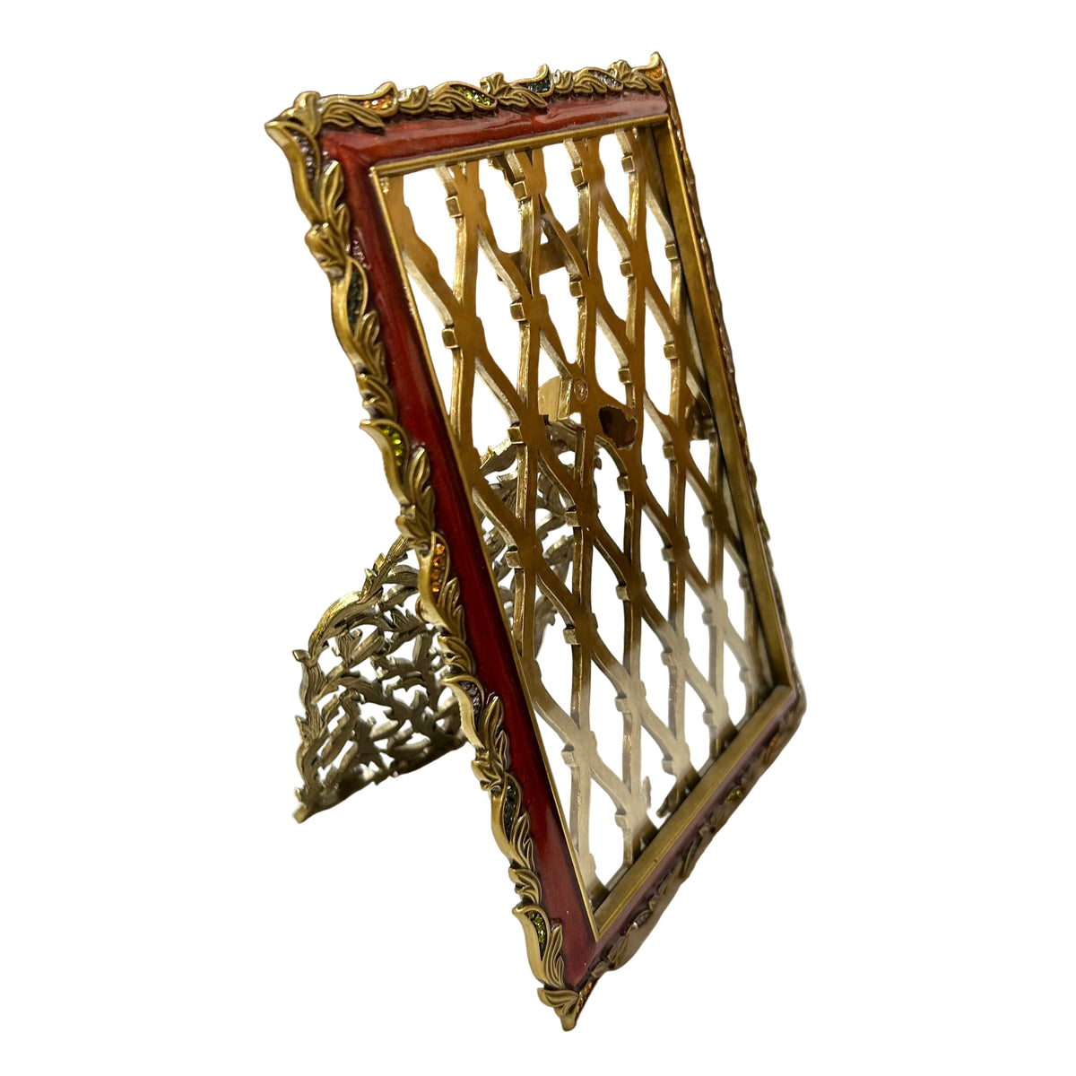 Decorative gold and red frame on a white surface